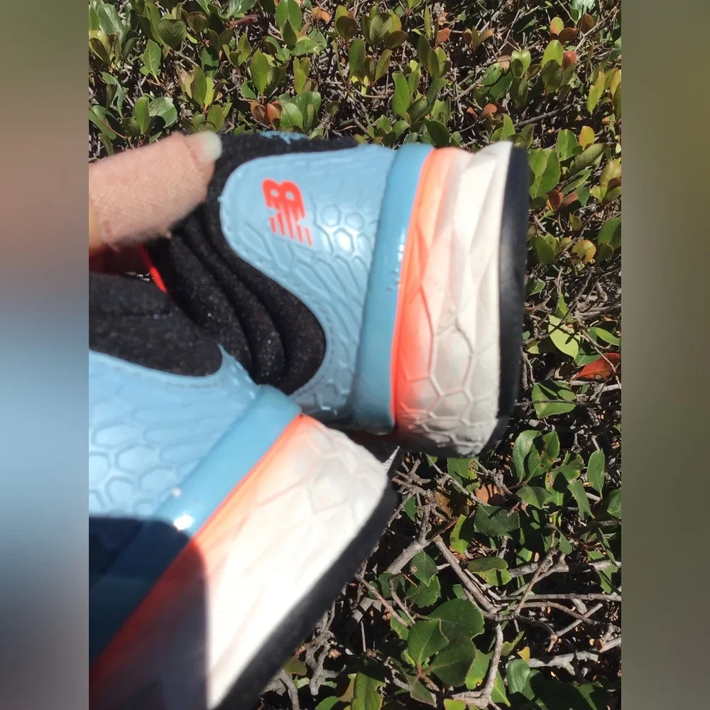 New Balance Women's Running Shoes - Light Blue with Coral Accents